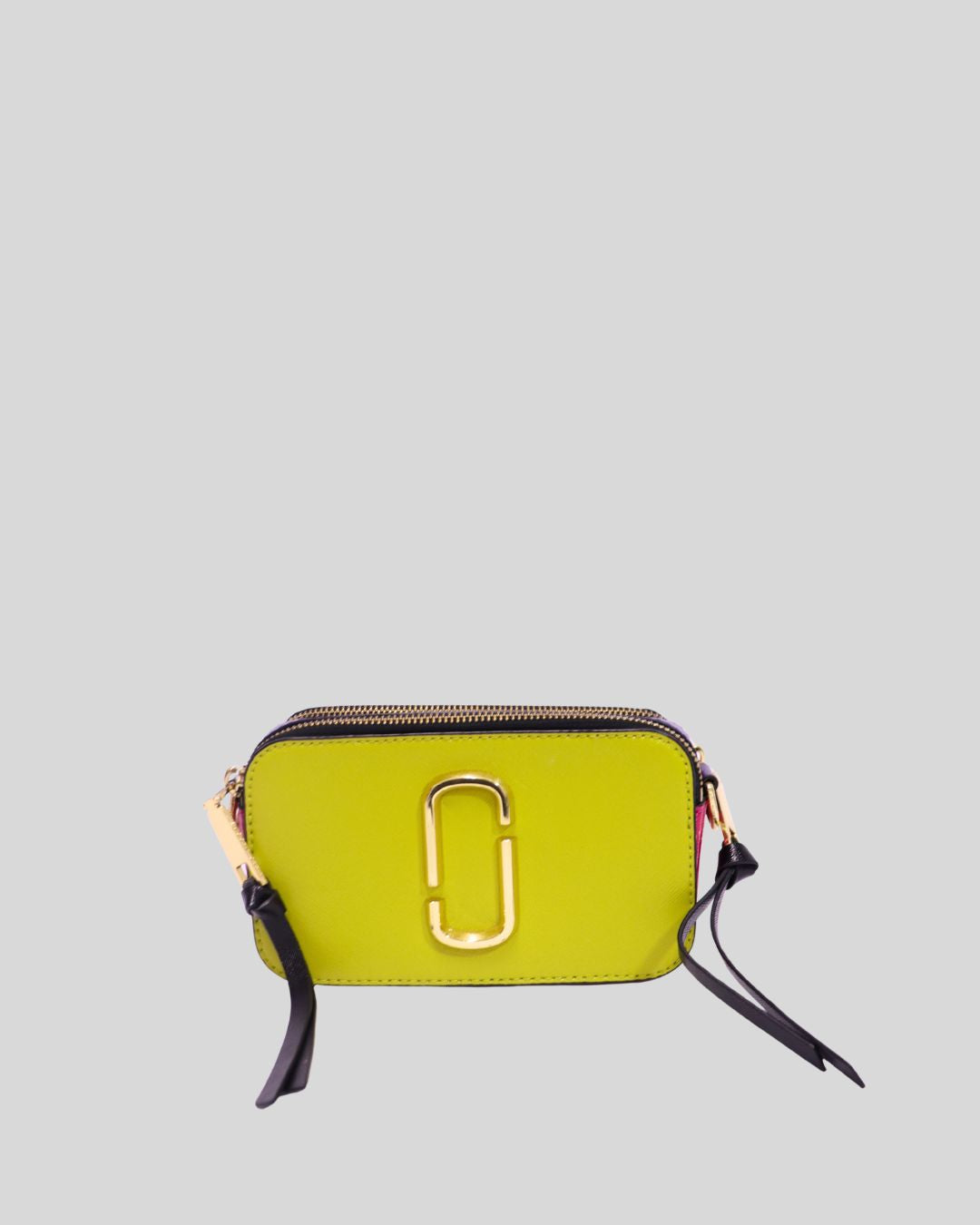Add a pop of color to your look with the Marc Jacobs Snapshot Camera Bag, a modern crossbody that has become a signature in the brand’s lineup. Crafted from multicolored saffiano leather, this compact bag is accented with the iconic double-J gold hardware