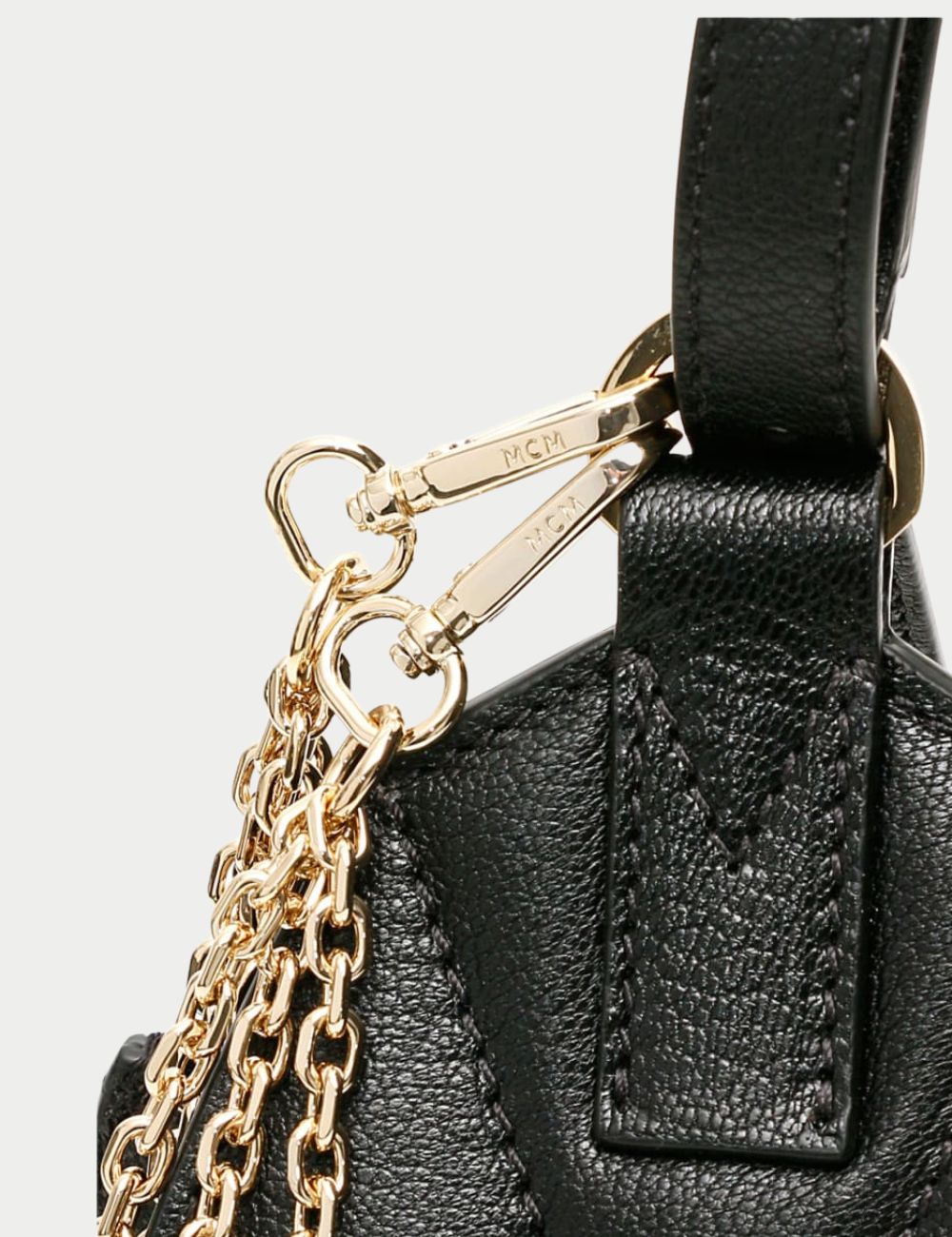 MCM Milano Black Leather Belt Bag with Gold Chain Detail
:Sleek, structured, and effortlessly stylish, the MCM Milano Belt Bag brings luxury to hands-free convenience. Crafted in rich black pebbled leather with a distinctive teardrop silhouette, this mode MCM Milano Black Leather Belt Bag with Gold Chain Detail
:Sleek, structured, and effortlessly stylish, the MCM Milano Belt Bag brings luxury to hands-free convenience. Crafted in rich black pebbled leather with a distinctive teardrop silhouette, this mode