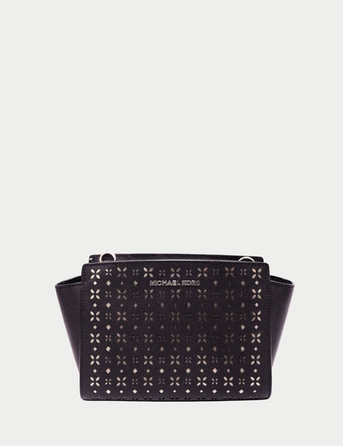 Designer Michael Kors bag with silver hardware and perforated design