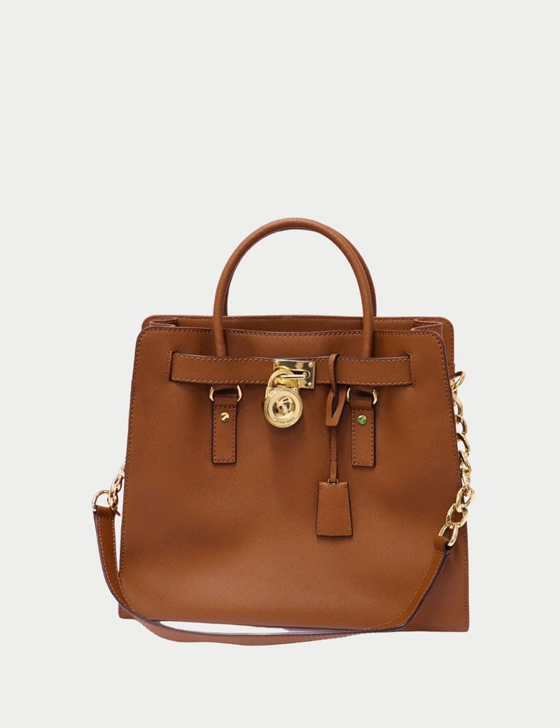 Michael Kors tan Saffiano leather satchel bag with gold lock detail and shoulder strap