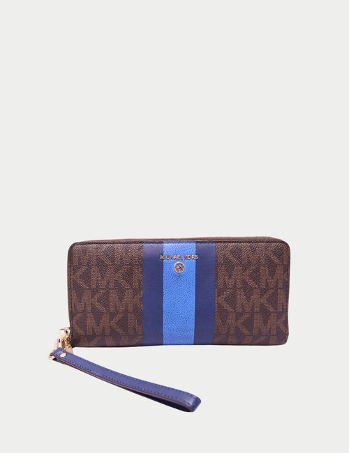 Michael Kors brown monogram zip-around wallet with blue vertical stripe and detachable wrist strap