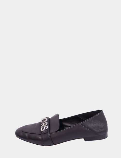 Michael Kors black leather loafers with metallic KORS logo