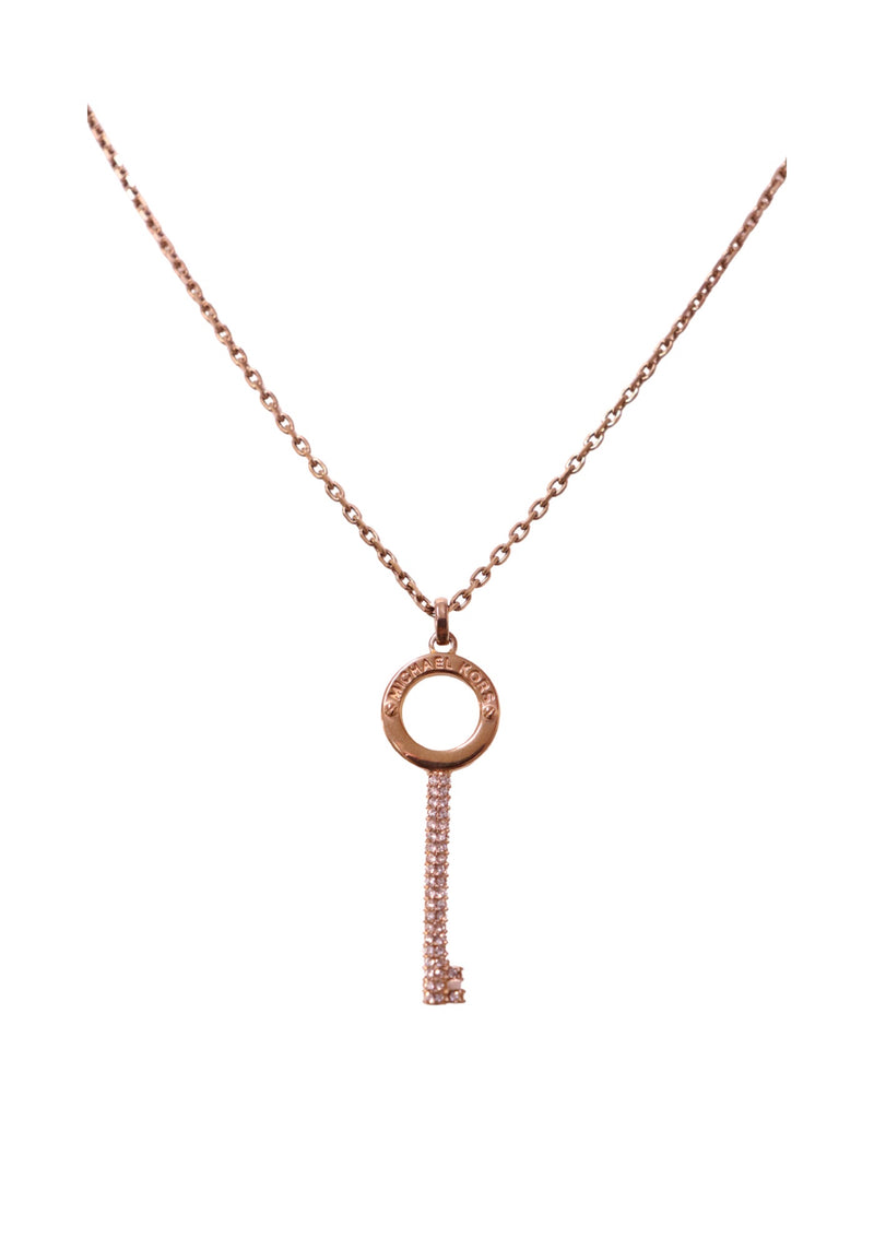 Authentic Michael Kors rose gold-tone necklace featuring a crystal pavé key pendant suspended from a signature logo ring.
