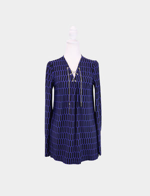 "Michael Kors navy and purple geometric long sleeve tunic top with lace-up neckline"

