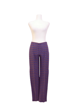 Missoni women's wide-leg knit pants featuring the brand's signature zigzag pattern in vibrant shades of blue and orange