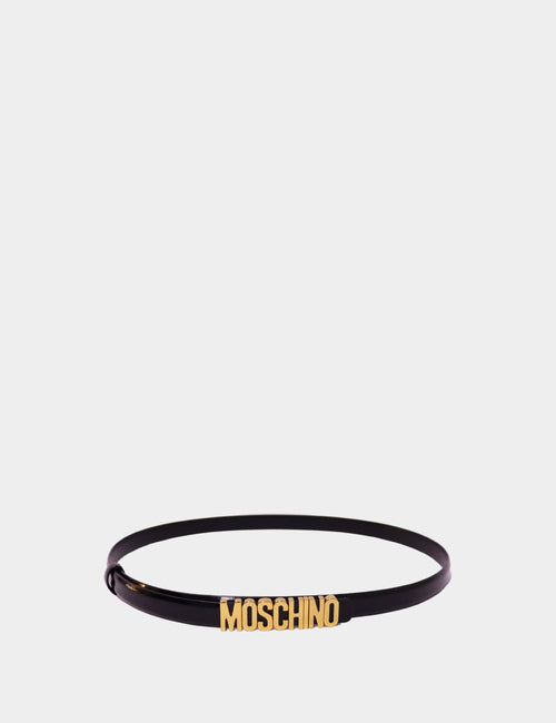 Moschino black patent leather skinny belt with gold-tone MOSCHINO logo plaque, displayed on a plain background.