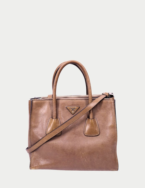 Prada brown leather tote bag with top handles and shoulder strap