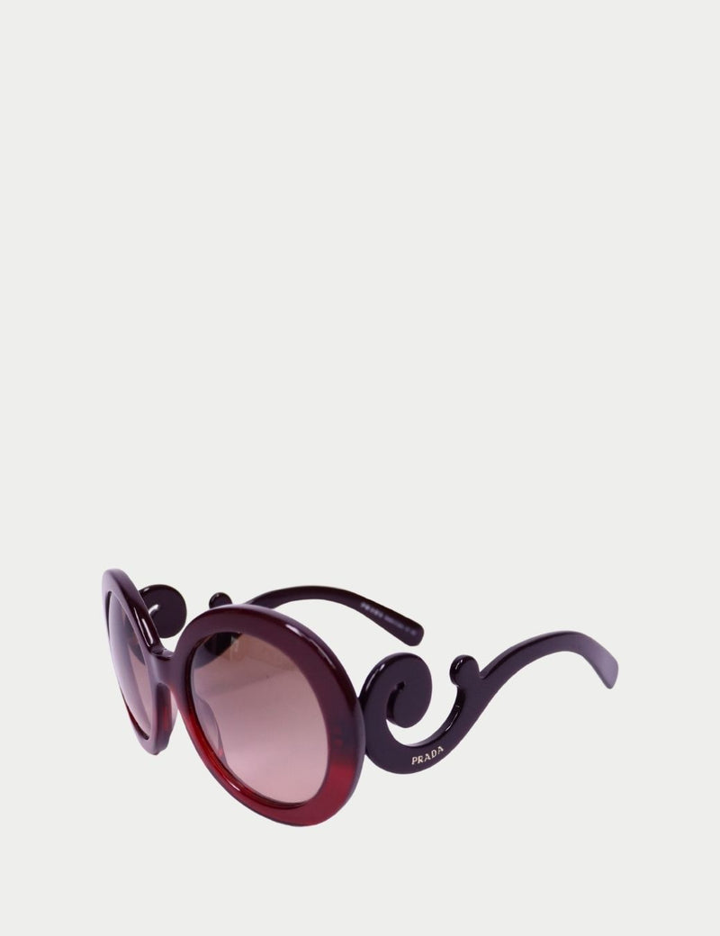 Prada Baroque oversized round sunglasses with black swirl temples and burgundy frame