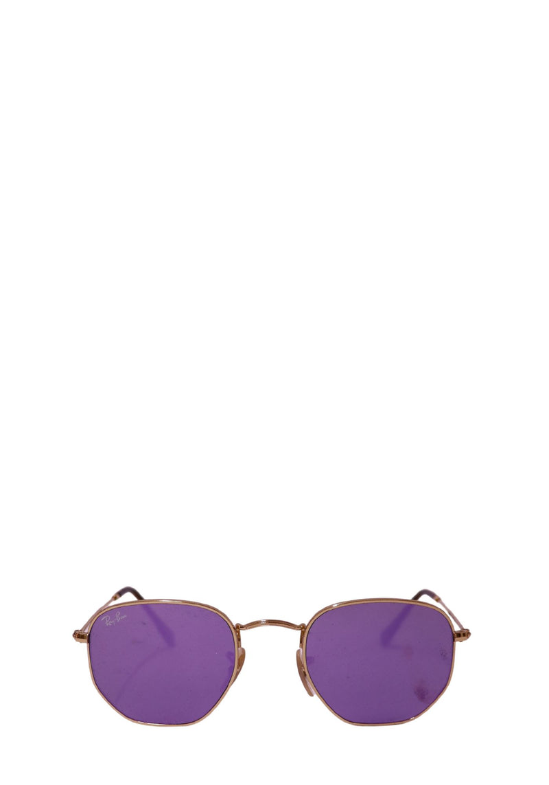 Ray-Ban gold metal hexagonal sunglasses with purple lenses displayed on a white background.
