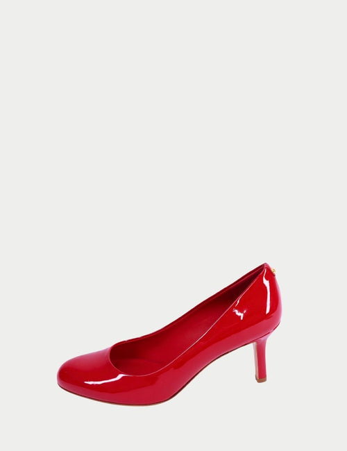 Red patent leather pumps by Salvatore Ferragamo featuring rounded toe and slim mid-height heel