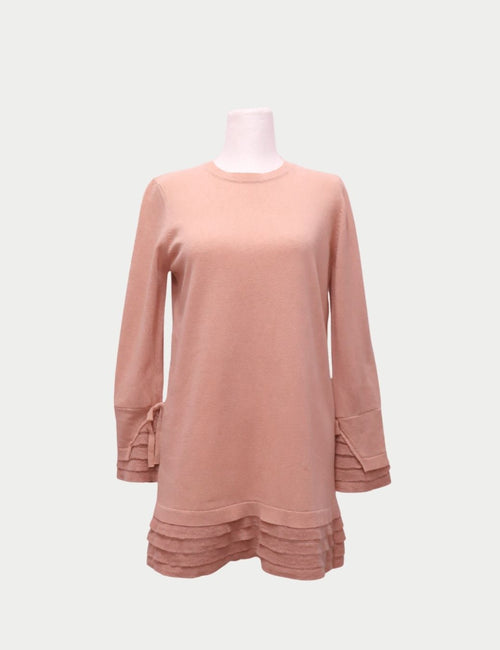 Red Valentino blush pink long-sleeve knit sweater dress with ruffle trim on cuffs and hem