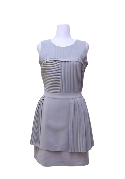 Authentic Reiss light grey sleeveless mini dress featuring pleated panel detailing, a round neckline, defined waist, and layered skirt