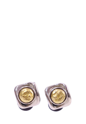 Saint Laurent clip-on earrings featuring a sculptural square-shaped silver-tone frame with textured gold-tone center accents