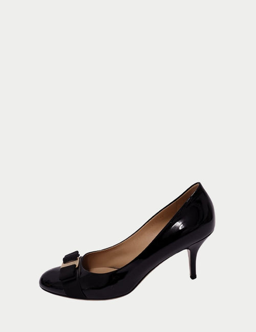 Salvatore Ferragamo black patent leather pumps with grosgrain Vara bow and gold logo plate