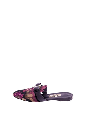 Floral jacquard slip-on mule loafers by Salvatore Ferragamo featuring pointed toe, leather strap with bow detail, and low-profile sole