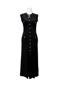 Sandro black sleeveless knit maxi dress featuring gold-tone front buttons, textured openwork bodice, decorative pockets and a fitted silhouette.