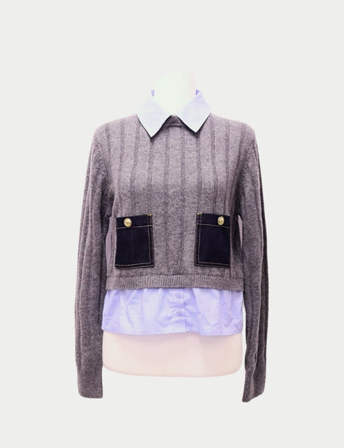 Grey Sandro Paris ribbed sweater with blue collar and denim pockets featuring gold buttons