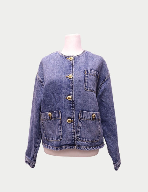 Light blue Sandro Paris denim jacket with gold buttons and three front pockets