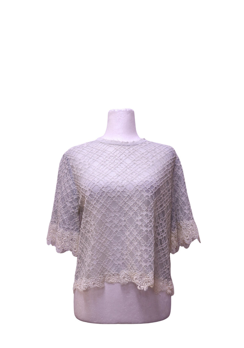 Authentic Sandro Paris cream floral lace short sleeve blouse featuring a round neckline, semi-sheer lace construction, and scalloped eyelash lace hem