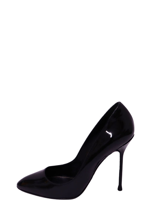 Sergio Rossi black patent leather pointed-toe pumps with glossy finish, elegant curved silhouette, and slim high stiletto heel