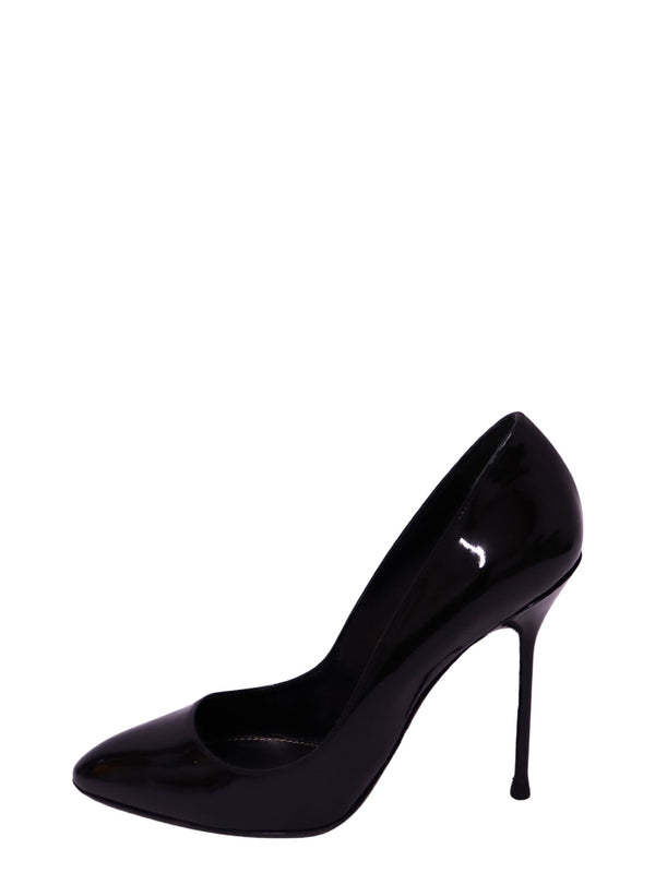 Sergio Rossi black patent leather pointed-toe pumps with glossy finish, elegant curved silhouette, and slim high stiletto heel