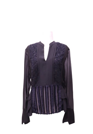 3.1 Phillip Lim black peplum blouse featuring tonal floral embroidered front panels, split V-neckline, sheer long sleeves, wide cuffs, and a vertically striped textured peplum hem