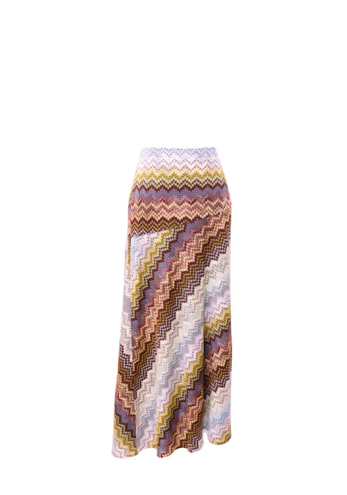 Missoni multicolor knit maxi skirt featuring burgundy, pink, mustard yellow, cream and lavender zigzag chevron patterns, a high waistband, diagonal patterned panels and a flowing flared hem
