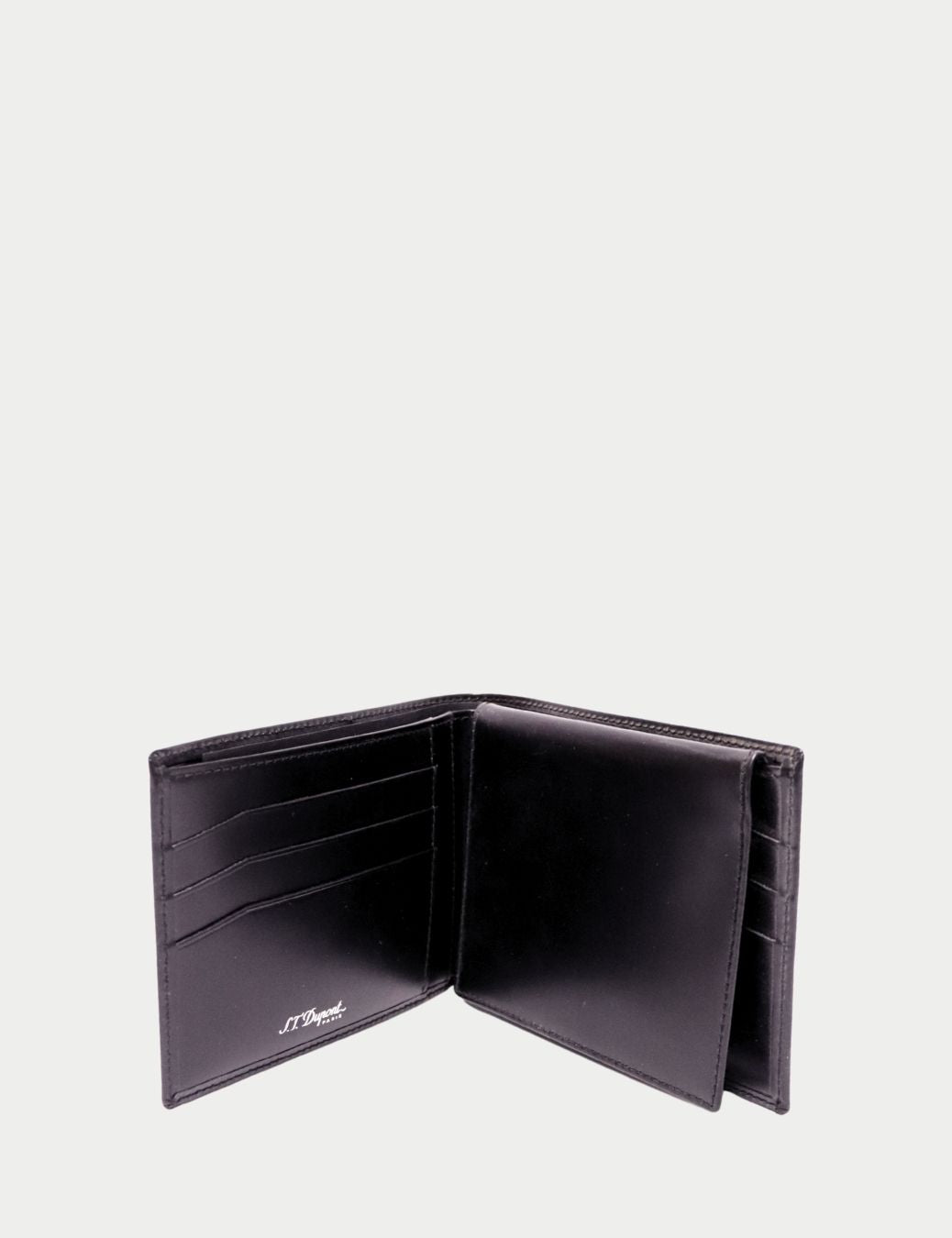 S.T. Dupont Black Leather Bi-Fold Wallet with Silver Logo Emblem
Exuding timeless French sophistication, this S.T. Dupont black leather wallet is the ultimate accessory for the modern gentleman. Crafted from smooth calfskin leather, it features the brand’ S.T. Dupont Black Leather Bi-Fold Wallet with Silver Logo Emblem
Exuding timeless French sophistication, this S.T. Dupont black leather wallet is the ultimate accessory for the modern gentleman. Crafted from smooth calfskin leather, it features the brand’
