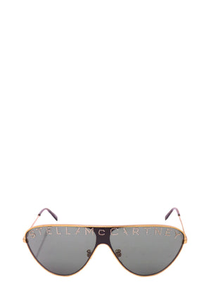 Stella McCartney oversized shield aviator sunglasses with gold-tone metal frame, dark tinted lens and crystal logo lettering