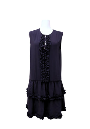 Stella McCartney navy sleeveless tiered mini dress with cascading ruffle trim, keyhole neckline, and layered ruffle hem.