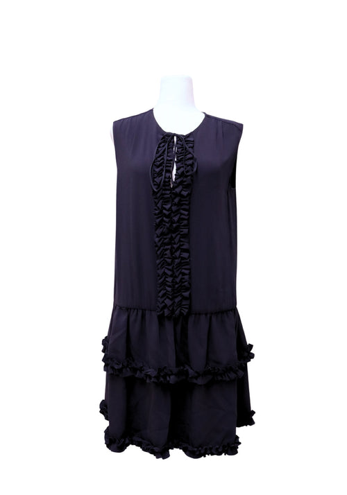 Stella McCartney navy sleeveless tiered mini dress with cascading ruffle trim, keyhole neckline, and layered ruffle hem.