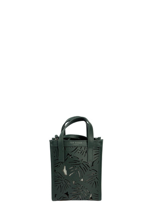 Ted Baker green mini tote bag with laser-cut tropical leaf pattern, dual top handles, detachable crossbody strap, and gold-tone logo