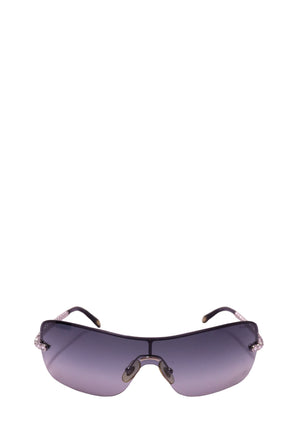Tiffany & Co. rimless shield sunglasses with grey gradient lenses and crystal-accented silver-tone chain temples.