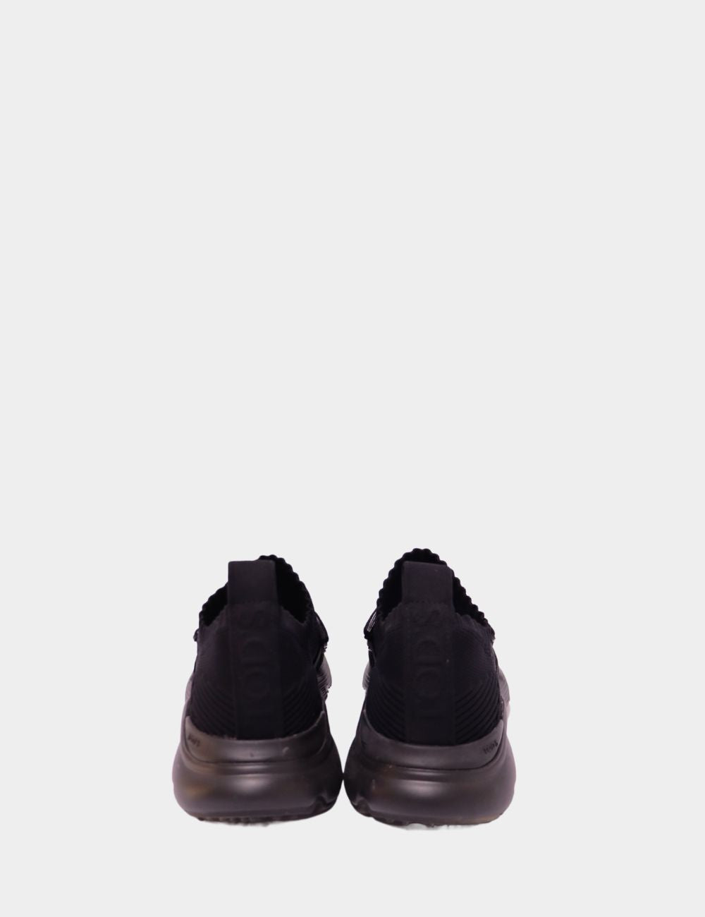 Tod’s Black Knit Slip-On Sneakers with Signature T Detail
Elevate your everyday footwear with these Tod’s Black Slip-On Sneakers, blending sporty ease with the elegance of Italian design. Crafted from breathable stretch-knit fabric, these sneakers offer a Tod’s Black Knit Slip-On Sneakers with Signature T Detail
Elevate your everyday footwear with these Tod’s Black Slip-On Sneakers, blending sporty ease with the elegance of Italian design. Crafted from breathable stretch-knit fabric, these sneakers offer a