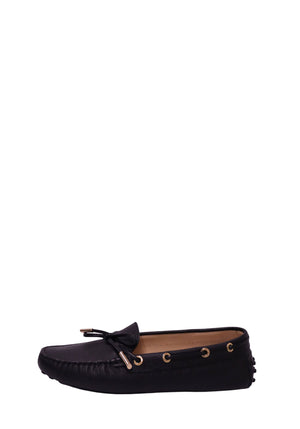 Tod’s black leather Gommino driving loafers with gold-tone eyelets and tie detail