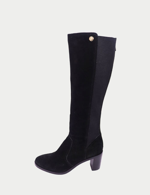 Tory Burch black suede knee-high boots with block heel, stretch panel, and gold-tone logo button