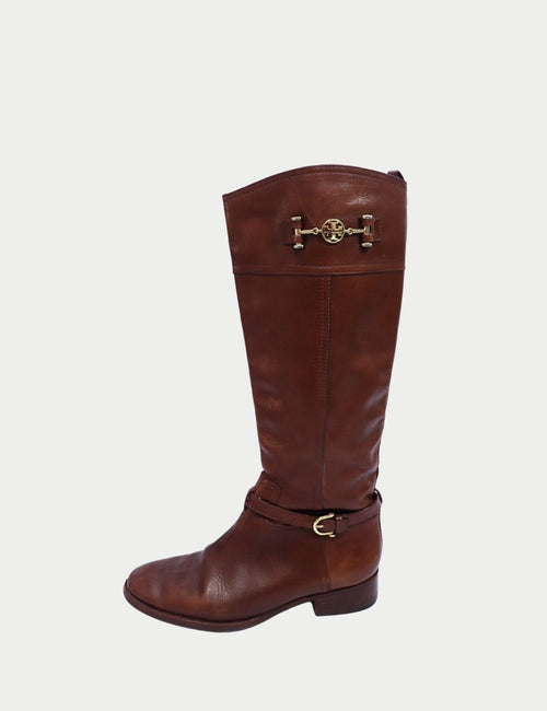 Tory Burch brown leather knee-high riding boots with gold-tone logo hardware and ankle buckle strap