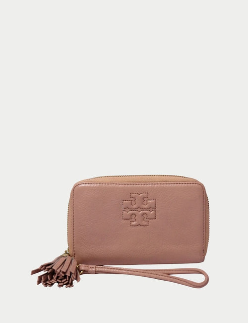 Tory Burch blush pink leather zip wallet with tassel wristlet