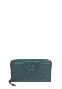 Tory Burch Fleming forest green quilted leather zip-around wallet with embossed Double T logo and gold-tone zipper.