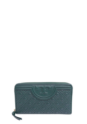 Tory Burch Fleming forest green quilted leather zip-around wallet with embossed Double T logo and gold-tone zipper.