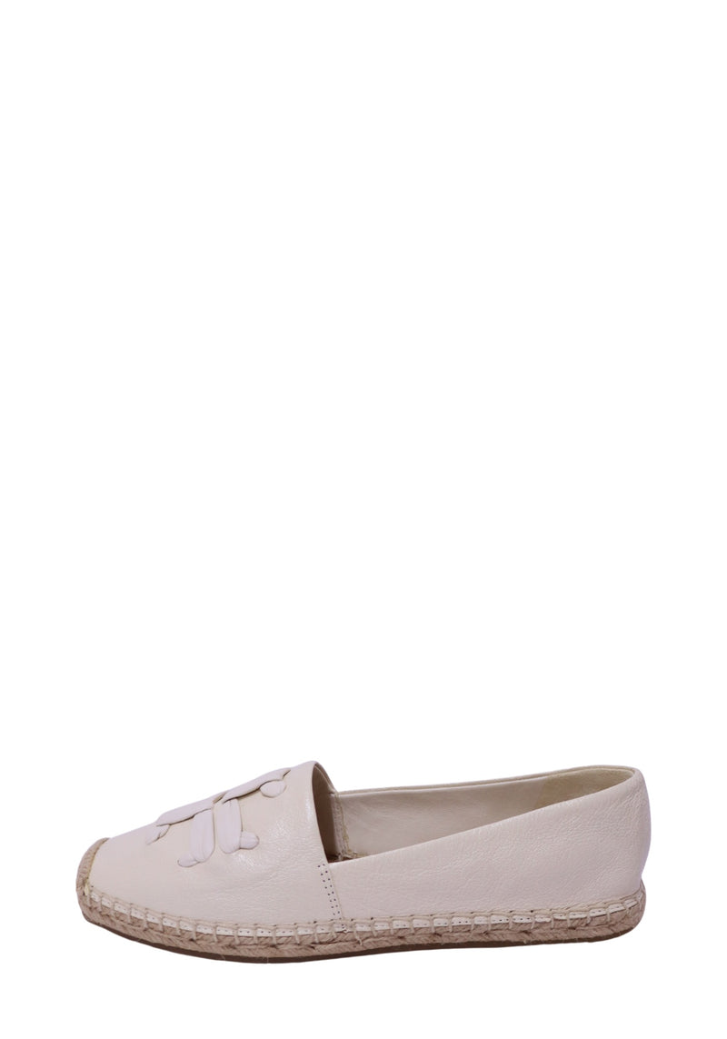 Authentic Tory Burch cream leather espadrille flats featuring the signature Double T logo, slip-on silhouette, and classic hand-stitched jute sole
