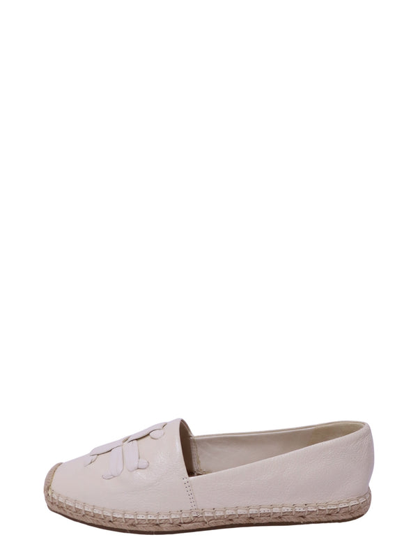 Authentic Tory Burch cream leather espadrille flats featuring the signature Double T logo, slip-on silhouette, and classic hand-stitched jute sole