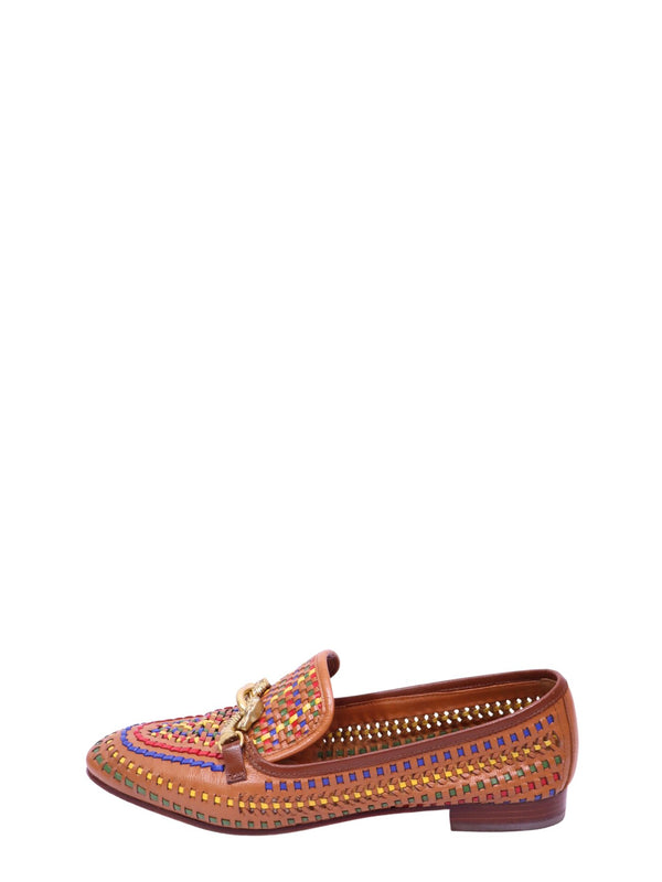Tory Burch camel leather loafers featuring intricate multicolor woven detailing, signature gold-tone hardware, a classic slip-on silhouette, and a low stacked heel