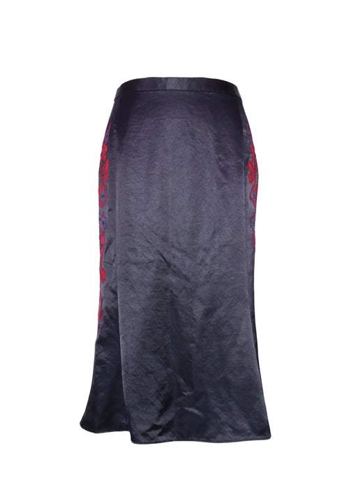 Tory Burch navy satin midi skirt with red floral embroidery along the side, featuring a fitted silhouette and slight flare hem