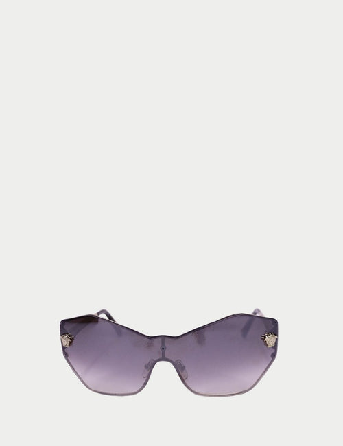 Versace geometric shield sunglasses with frameless gradient grey lens, silver arms, and Medusa emblem