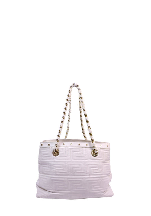 Versace white leather shoulder tote featuring an embossed monogram pattern, gold-tone stud details, and chain-threaded shoulder straps