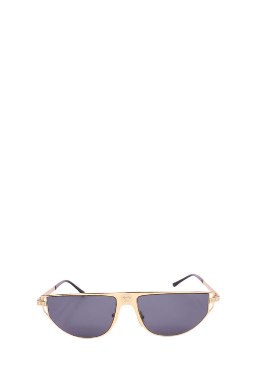 Versace gold-tone shield sunglasses with dark grey lenses, Greca-pattern temples, and adjustable nose pads.