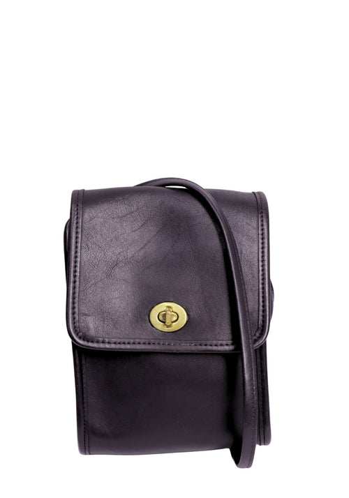 Vintage Coach black leather messenger crossbody bag with brass turn-lock closure and adjustable shoulder strap