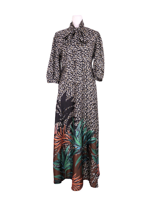 Adele Altman leopard print dress with tropical leaf hem and bow neckline