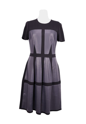 Authentic BCBG Max Azria black and slate grey midi dress with faux leather panel detailing, short sleeves, and flared skirt silhouette.